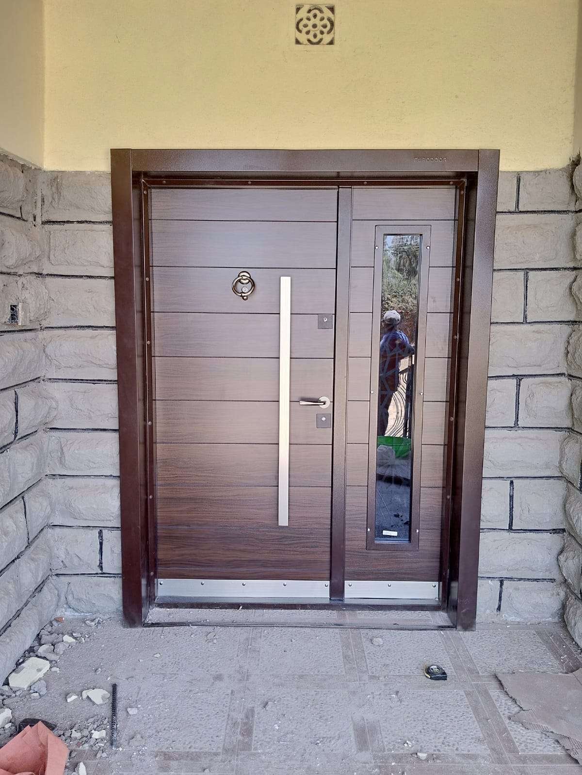 luxury brown steel door with long handle